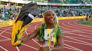 Shelly-Ann Fraser-Pryce reacts after winning World Athletics Championships 2022 100m gold.