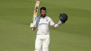 Cheteshwar Pujara celebrates after scoring his double ton for Sussex. 