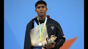 Weightlifter Sanket Sargar poses with his silver at the 2022 CWG