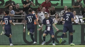 PSG's Lionel Messi, third from left, celebrates with his teammates a goal against Nantes in the French Super Cup 2022.