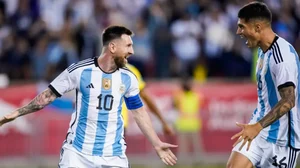 Lionel Messi (L) celebrates after scoring for Argentina against Jamaica on Tuesday.