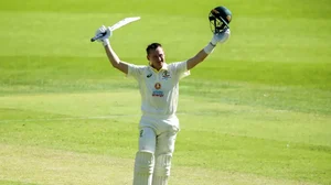 Labuschagne celebrates after scoring his century against West Indies on Day 1 of the 1st Test.