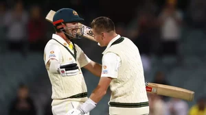 Labuschagne, right, celebrates with Head after scoring century on Day 1 of the 2nd Test against WI.