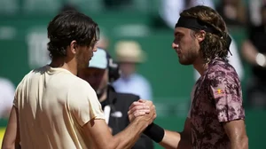 Tsitsipas, right, congratulates Fritz after his quarterfinal win in Monaco on Friday.