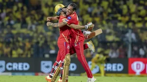 Raza celebrates with team-mate Rahul Chahar after scoring the winning runs in Chennai on Sunday.