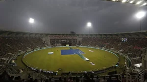 The pitch area is covered in sheets after rain stopped play in Lucknow on Wednesday.