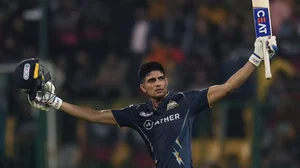 Shubman Gill celebrates after reaching his hundred against RCB on Sunday.