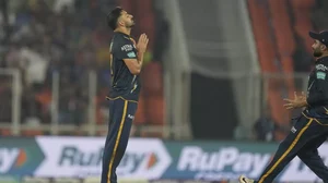 Mohit Sharma celebrates the wicket of Suryakumar Yadav in Ahmedabad on Friday.