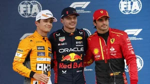 Verstappen, centre, poses with Sainz and Norris, who grabbed 2nd and 3rd positions in Quali.