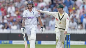 Smith, left, condoles with Stokes after his dismissal at Lord's on Sunday.