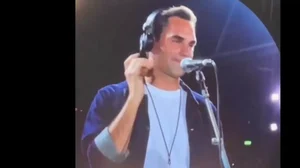 Roger Federer on stage at the Coldplay concert.