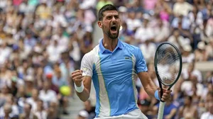 Novak Djokovic reacts after defeating Taylor Fritz in the US Opem quarter-finals.