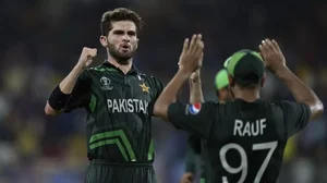 Pakistan's Shaheen Shah Afridi (L) and Haris Rauf celebrate a South African wicket in Chennai.