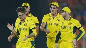 Australia celebrate the wicket of England captain Jos Buttler in Ahmedabad.