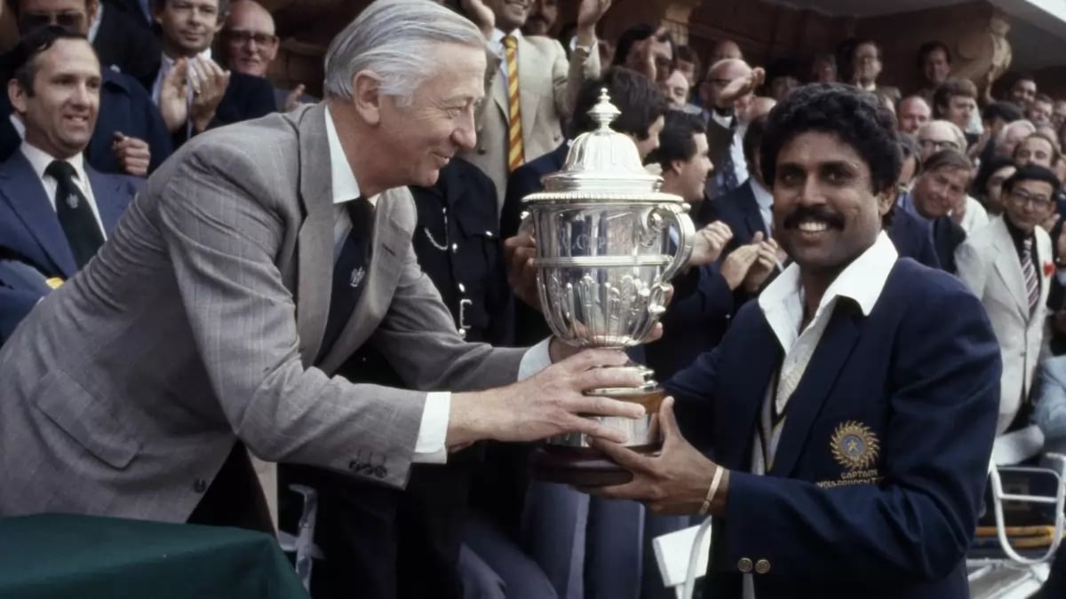 Kapil Dev with the 1983 winning trophy at Lords