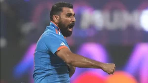 Mohammed Shami celebrates the wicket of Rachin Ravindra in the first semifinal match between India a
