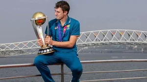 Australian skipper Pat Cummins posing with the trophy