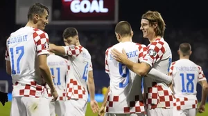 Croatian football players celebrate a goal