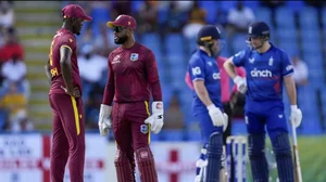 West Indies' captain Shai Hope talks to bowler Alzarri Joseph during 2nd ODI match