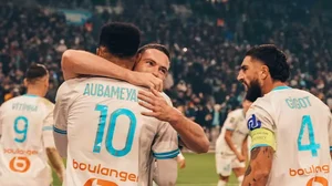 Marseille players celebrate their win against Lyon in Ligue 1 football match