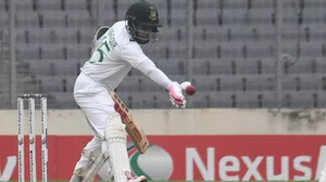 Bangladesh's Mushfiqur Rahim handles the ball during their match against New Zealand