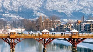 Iconic Landmark: The Zero Bridge with the Himalayas in the backdrop 