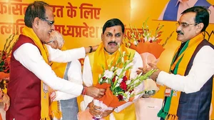 Post Poll: Shivraj Singh Chouhan (left) and VD Sharma, state president of the BJP in MP (right) greet Mohan Yadav