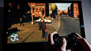 A young man plays Grand Theft Auto IV on the game's day of release on April 29, 2008 in London