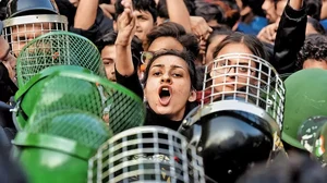 Demonstrators during a march to Parliament in 2020 against the Citizenship Amendment Act (CAA), National Register of Citizens (NRC) and National Population Register (NPR), near Jamia Millia Islamia University, New Delhi