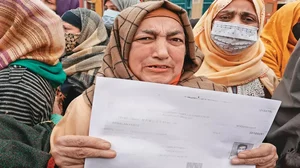 The family of Arsalan, a nineteen-year-old from Zaldagar, Srinagar protests in 2022 against his arrest by the National Investigation Agency