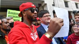 Union organizer Christian Smalls (L) celebrates with Amazon workers following the April 1, 2022, vote for the unionization of the Amazon Staten Island warehouse in New York. 