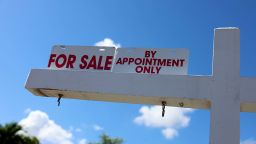 MIAMI, FLORIDA - FEBRUARY 22: A For Sale sign displayed in front of a home on February 22, 2023 in Miami, Florida. US home sales declined in January for the 12th consecutive month as high mortgage rates along with high prices kept people shopping for homes out of the market. It was the weakest home sales activity since 2010. (Photo by Joe Raedle/Getty Images)