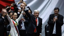 MEXICO CITY, MEXICO - OCTOBER 01: New President of Mexico Claudia Sheinbaum and the Outgoing President of Mexico Andres Manuel Lopez Obrador wave as part of the presidential inauguration on October 01, 2024 in Mexico City, Mexico. Claudia Sheinbaum takes office as the first female president of Mexico following an overwhelming victory in the presidential election. (Photo by Manuel Velasquez/Getty Images)