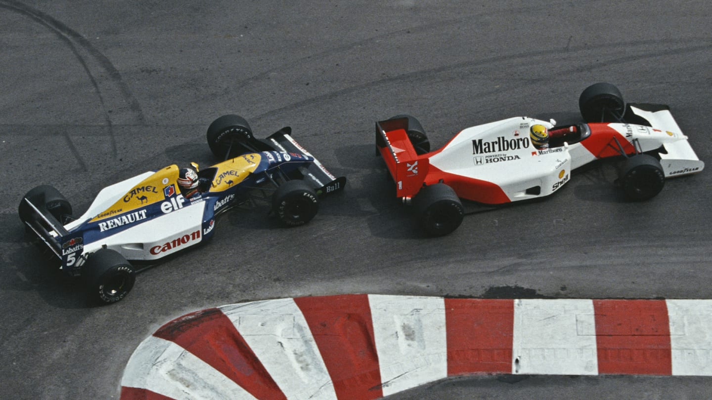 Nigel Mansell of Great Britain driving the #5 Canon Williams Renault Williams FW14B Renault V10