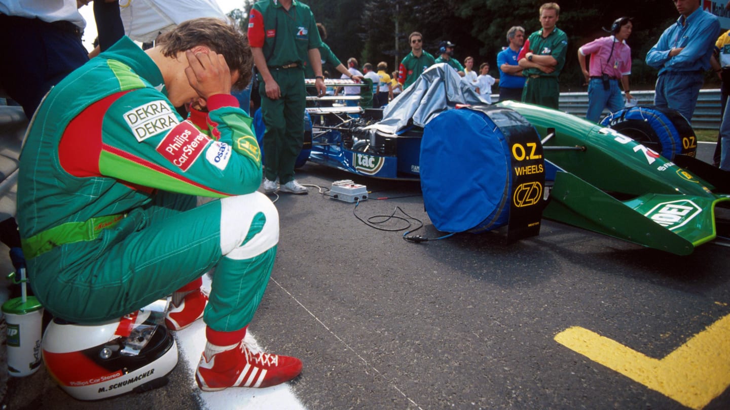 Michael Schumacher (GER) attempts to block himself from the frantic grid activity to concentrate on