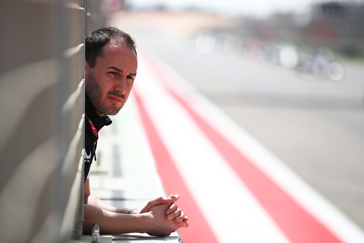 BAHRAIN, BAHRAIN - MARCH 02: Oliver Oakes, Team Principal of Hitech Pulse-Eight looks on from the