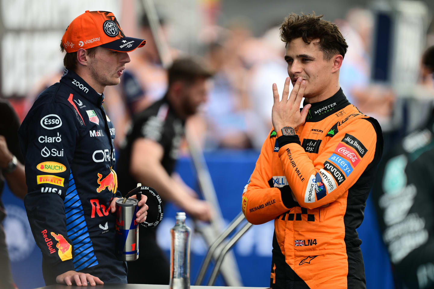 Max Verstappen of Red Bull Racing Honda Team and Lando Norris of McLaren F1 Team are speaking