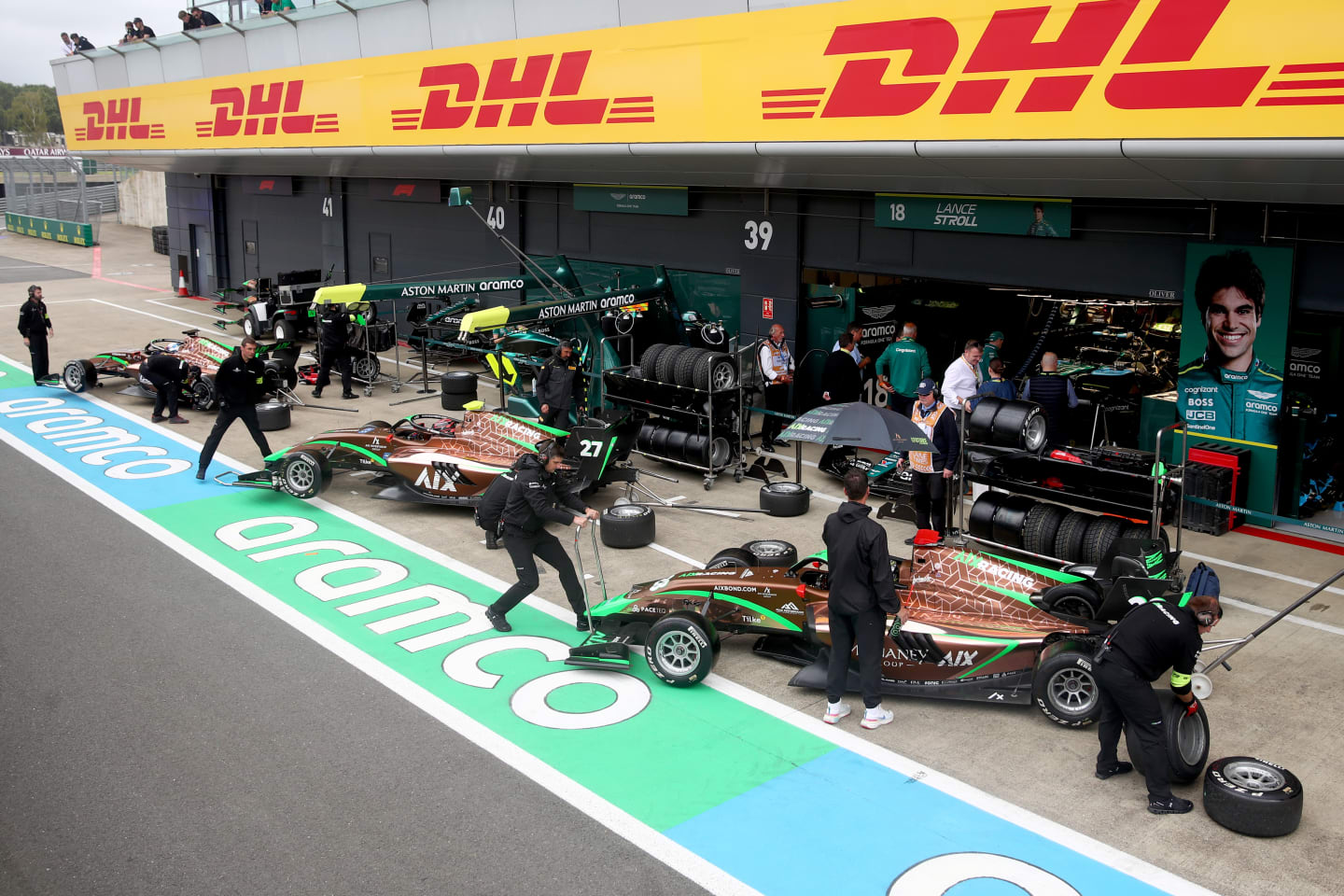 NORTHAMPTON, ENGLAND - JULY 05: The AIX Racing team work in the Pitlane during qualifying ahead of