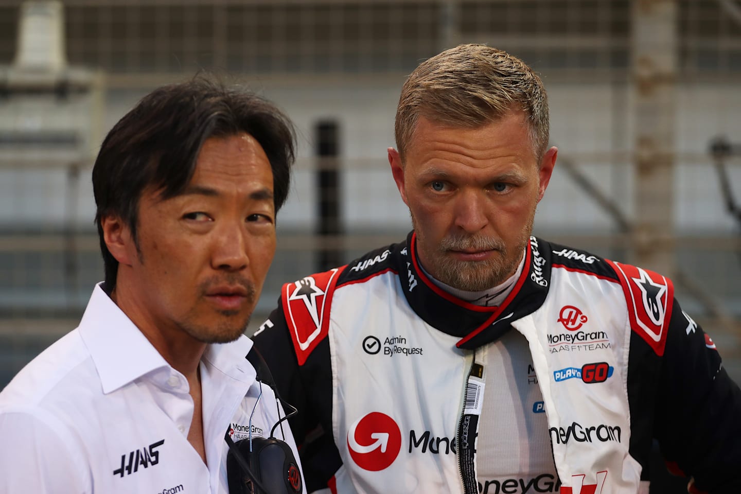 BAHRAIN, BAHRAIN - MARCH 02: Kevin Magnussen of Denmark and Haas F1 and Haas F1 Team Principal Ayao