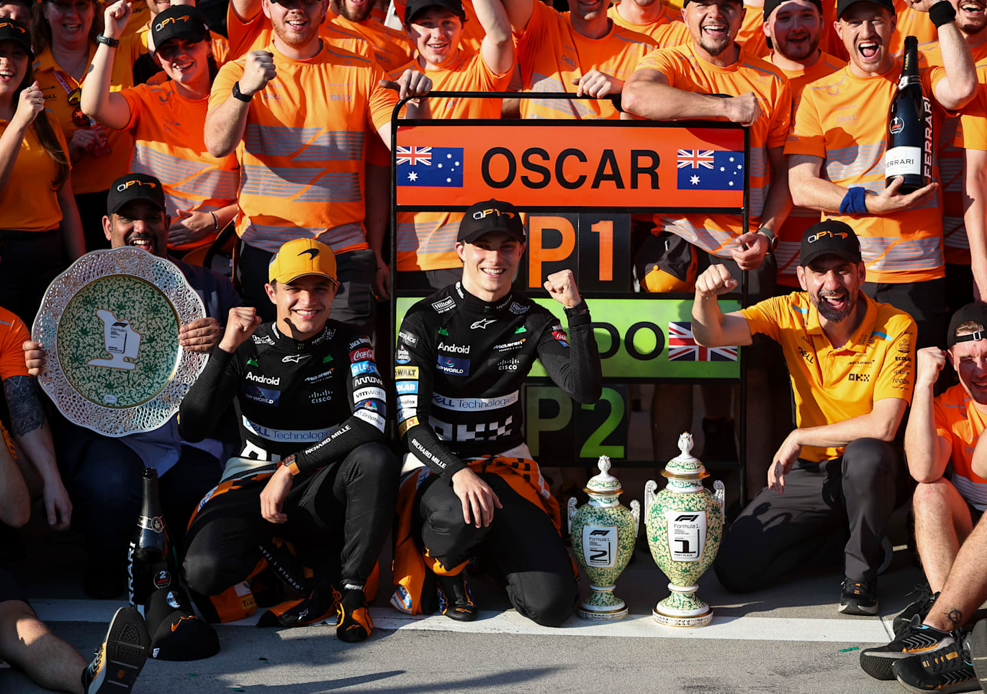 BUDAPEST, HUNGARY - JULY 21: Lando Norris of Great Britain and McLaren F1 Team (left) and Oscar