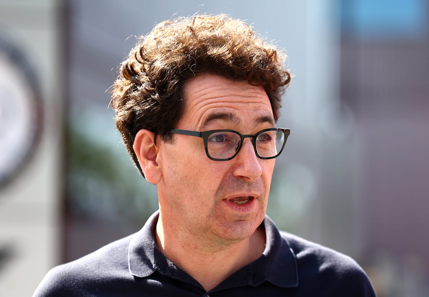 MONZA, ITALY - AUGUST 31: Mattia Binotto walks in the Paddock during previews ahead of the F1 Grand