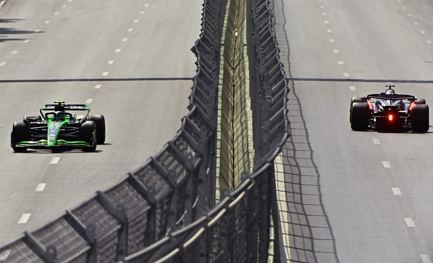 BAKU, AZERBAIJAN - SEPTEMBER 13: Zhou Guanyu of China driving the (24) Kick Sauber C44 Ferrari and Alexander Albon of Thailand driving the (23) Williams FW46 Mercedes on track during practice ahead of the F1 Grand Prix of Azerbaijan at Baku City Circuit on September 13, 2024 in Baku, Azerbaijan. (Photo by James Sutton/Getty Images)