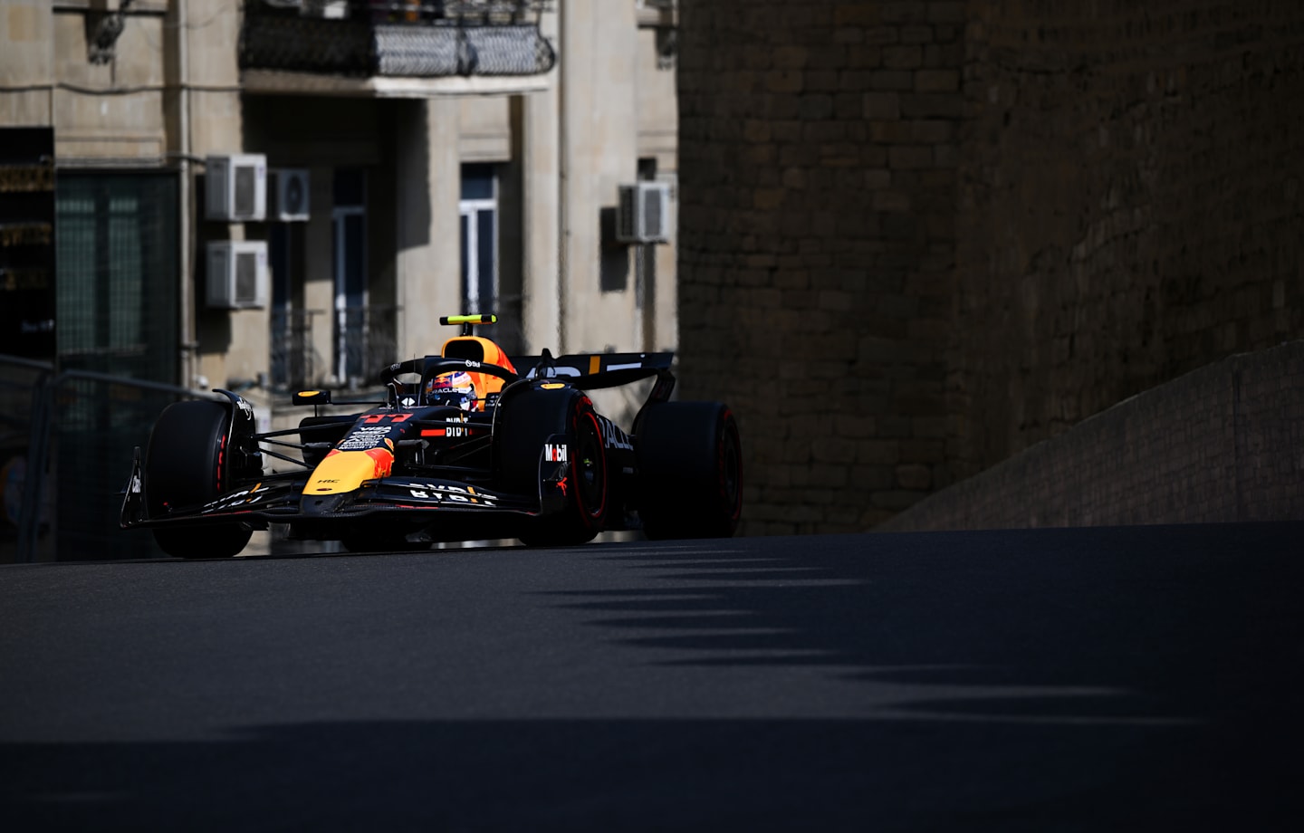 BAKU, AZERBAIJAN - SEPTEMBER 13: Sergio Perez of Mexico driving the (11) Oracle Red Bull Racing RB20 on track during practice ahead of the F1 Grand Prix of Azerbaijan at Baku City Circuit on September 13, 2024 in Baku, Azerbaijan. (Photo by Clive Mason/Getty Images)