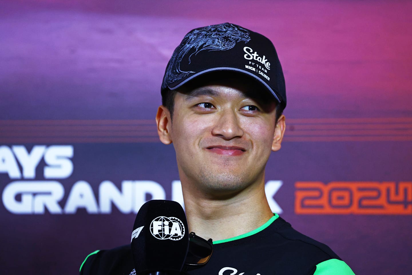 BAKU, AZERBAIJAN - SEPTEMBER 12: Zhou Guanyu of China and Stake F1 Team Kick Sauber attends the Drivers Press Conference during previews ahead of the F1 Grand Prix of Azerbaijan at Baku City Circuit on September 12, 2024 in Baku, Azerbaijan. (Photo by Clive Rose/Getty Images)