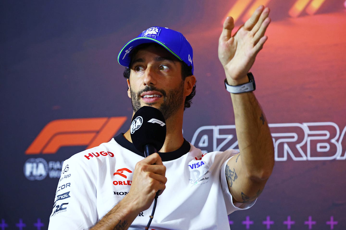 BAKU, AZERBAIJAN - SEPTEMBER 12: Daniel Ricciardo of Australia and Visa Cash App RB attends the Drivers Press Conference during previews ahead of the F1 Grand Prix of Azerbaijan at Baku City Circuit on September 12, 2024 in Baku, Azerbaijan. (Photo by Clive Rose/Getty Images)