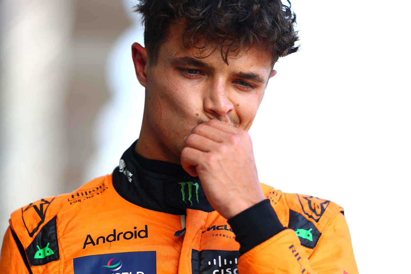 BAKU, AZERBAIJAN - SEPTEMBER 14: 17th placed qualifier Lando Norris of Great Britain and McLaren looks on in the Pitlane after being knocked out of qualifying ahead of the F1 Grand Prix of Azerbaijan at Baku City Circuit on September 14, 2024 in Baku, Azerbaijan. (Photo by Clive Rose - Formula 1/Formula 1 via Getty Images)