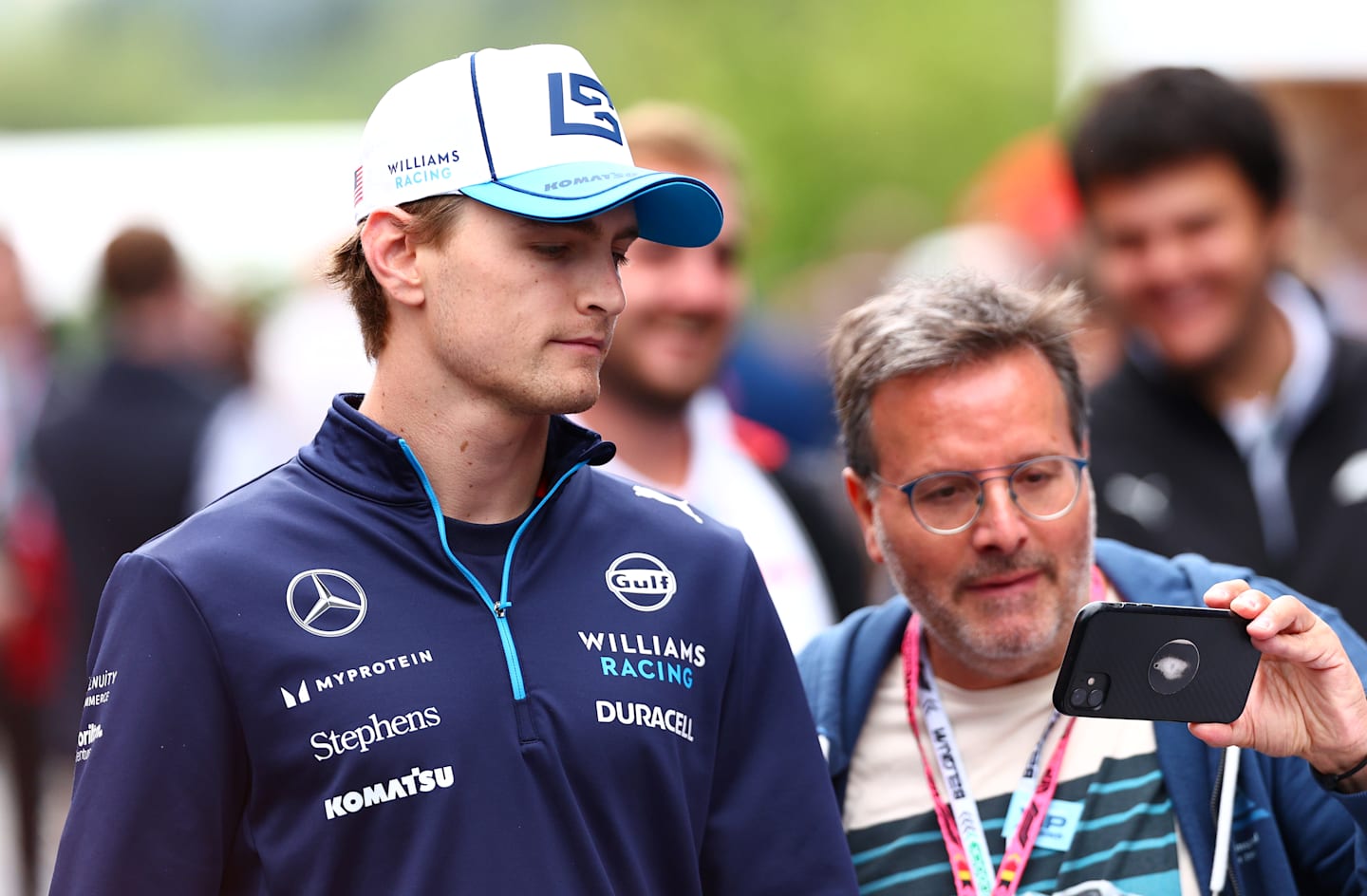 SPA, BELGIUM - JULY 27: Logan Sargeant of United States and Williams stops for a photo with a fan