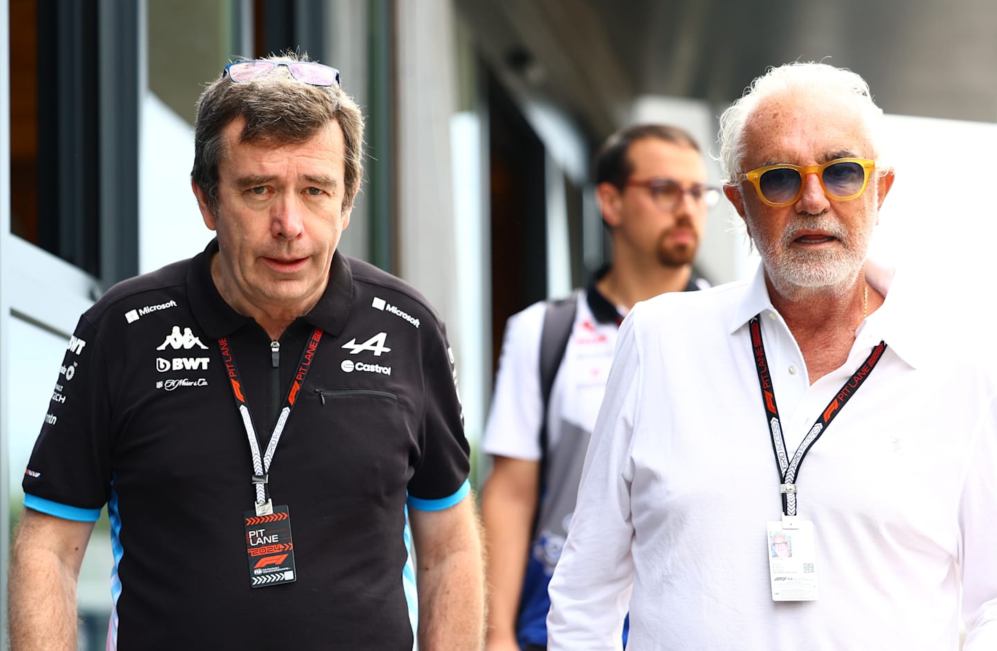 BUDAPEST, HUNGARY - JULY 20: Flavio Briatore, Executive Advisor to Alpine F1,  and Bruno Famin, Team Principal of Alpine F1 walk in the Paddock prior to final practice ahead of the F1 Grand Prix of Hungary. (Photo by Mark Thompson/Getty Images)