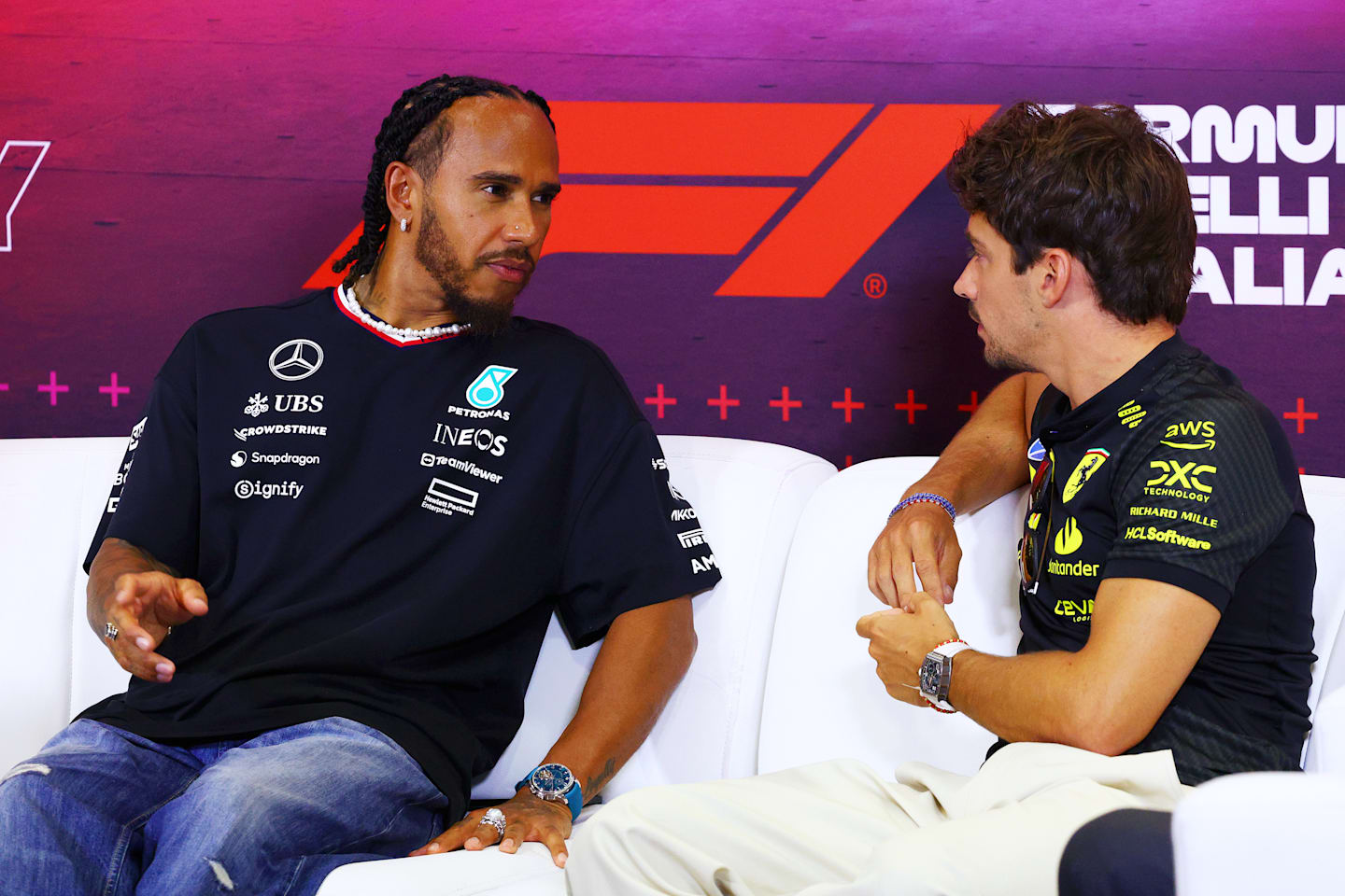 MONZA, ITALY - AUGUST 29: Lewis Hamilton of Great Britain and Mercedes and Charles Leclerc of