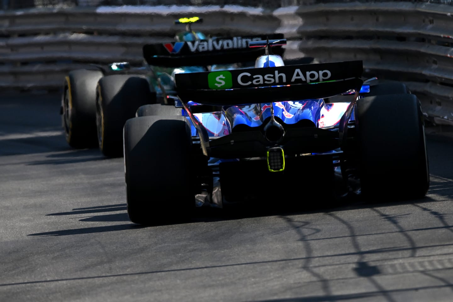 MONTE-CARLO, MONACO - MAY 26: Daniel Ricciardo of Australia driving the (3) Visa Cash App RB VCARB 01 chases Fernando Alonso of Spain driving the (14) Aston Martin AMR24 Mercedes on track during the F1 Grand Prix of Monaco at Circuit de Monaco on May 26, 2024 in Monte-Carlo, Monaco. (Photo by Rudy Carezzevoli/Getty Images)